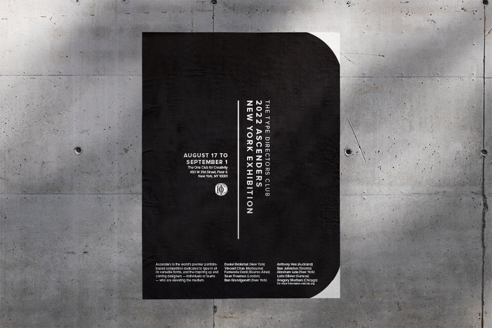 Black poster hanging on a concrete background